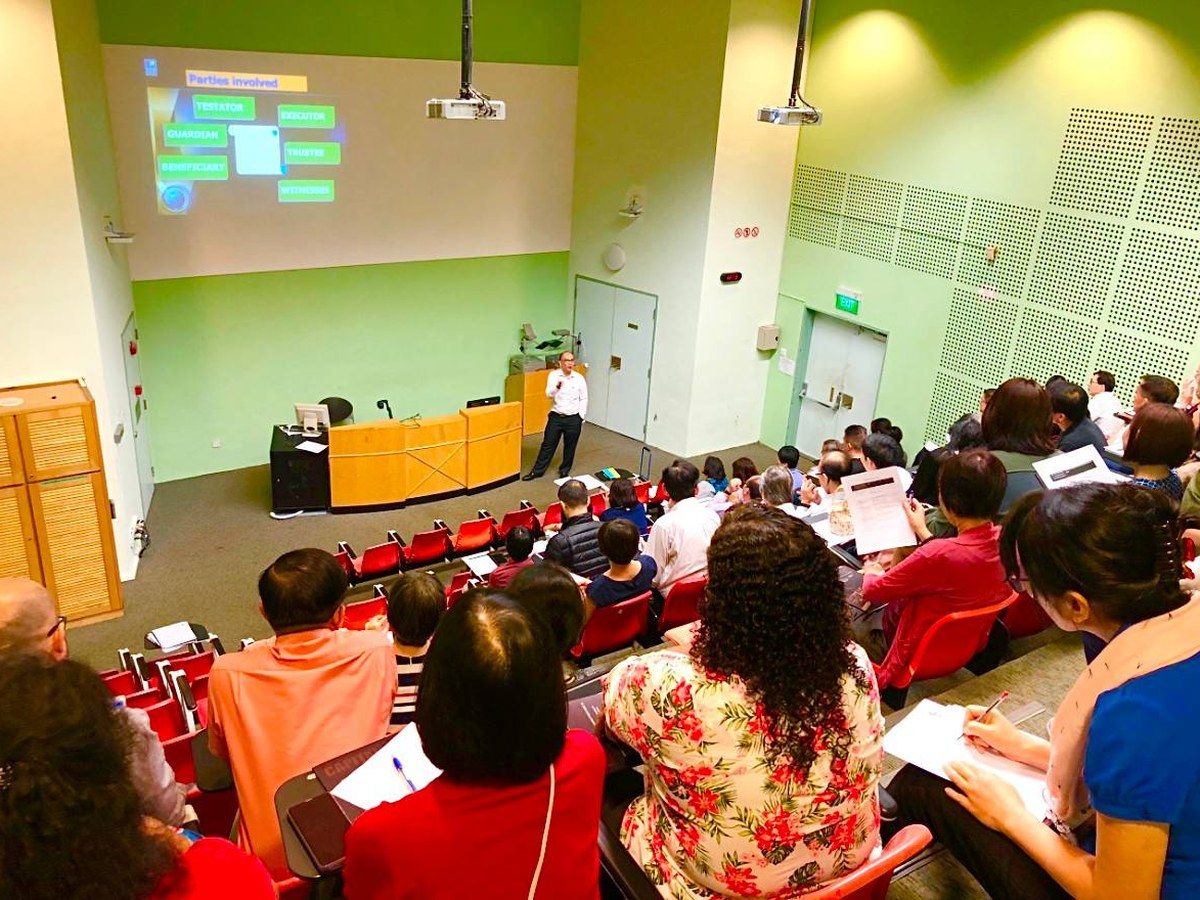 Estate and legacy planning lecture in a university auditorium